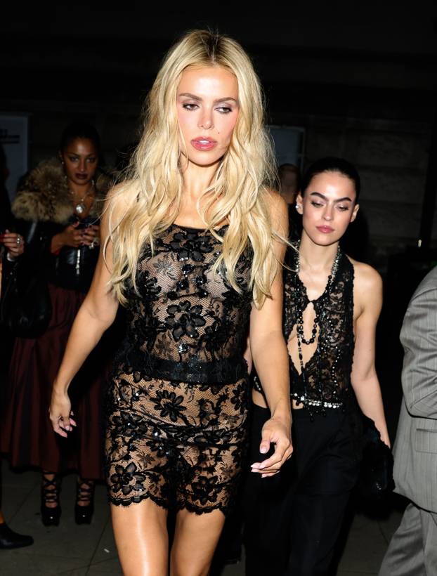 Brooks Nader makes a daring fashion statement in a sheer dress at 90s exhibition party