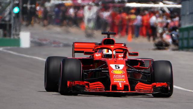 Ferrari's Sebastian Vettel  drives during a practice session at Circuit Gilles Villeneuve during a practice session for the F1 race in Montreal