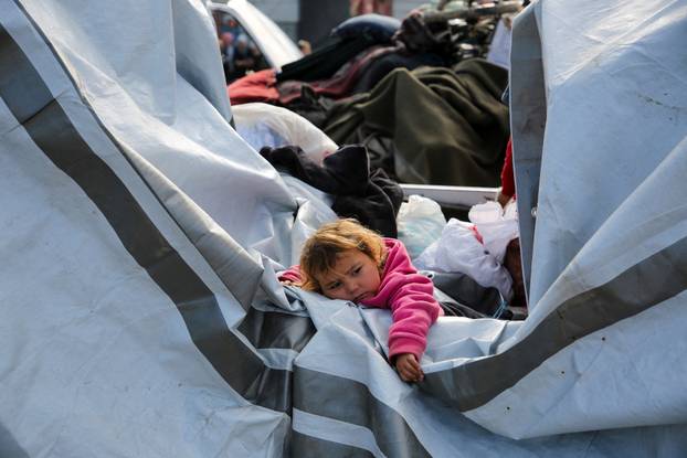 Displaced Palestinians wait to be allowed to return to their homes in northern Gaza, in the central Gaza Strip