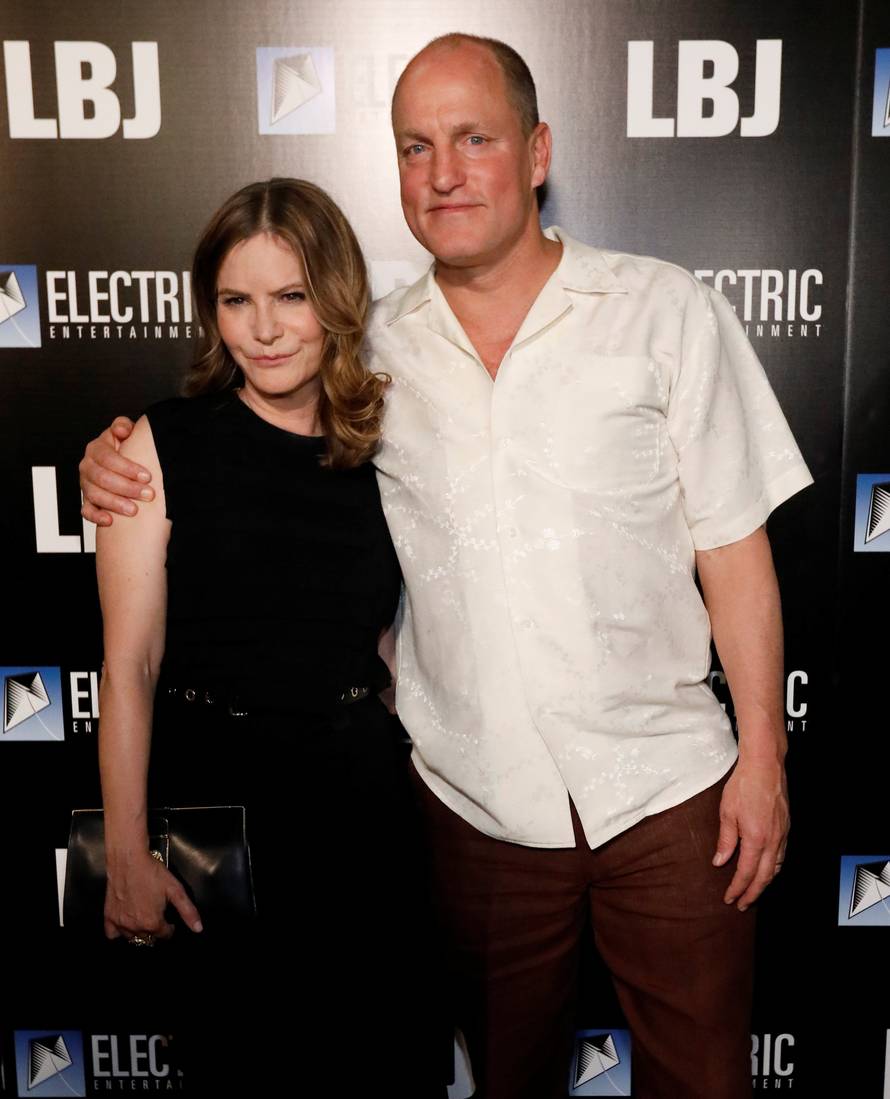 Cast members Harrelson and Leigh pose at the premiere for "LBJ" in Los Angeles