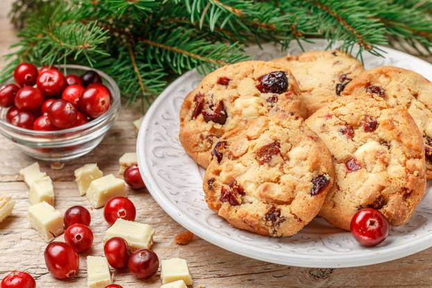 Homemade Christmas cranberry cookies with white chocolate in a b