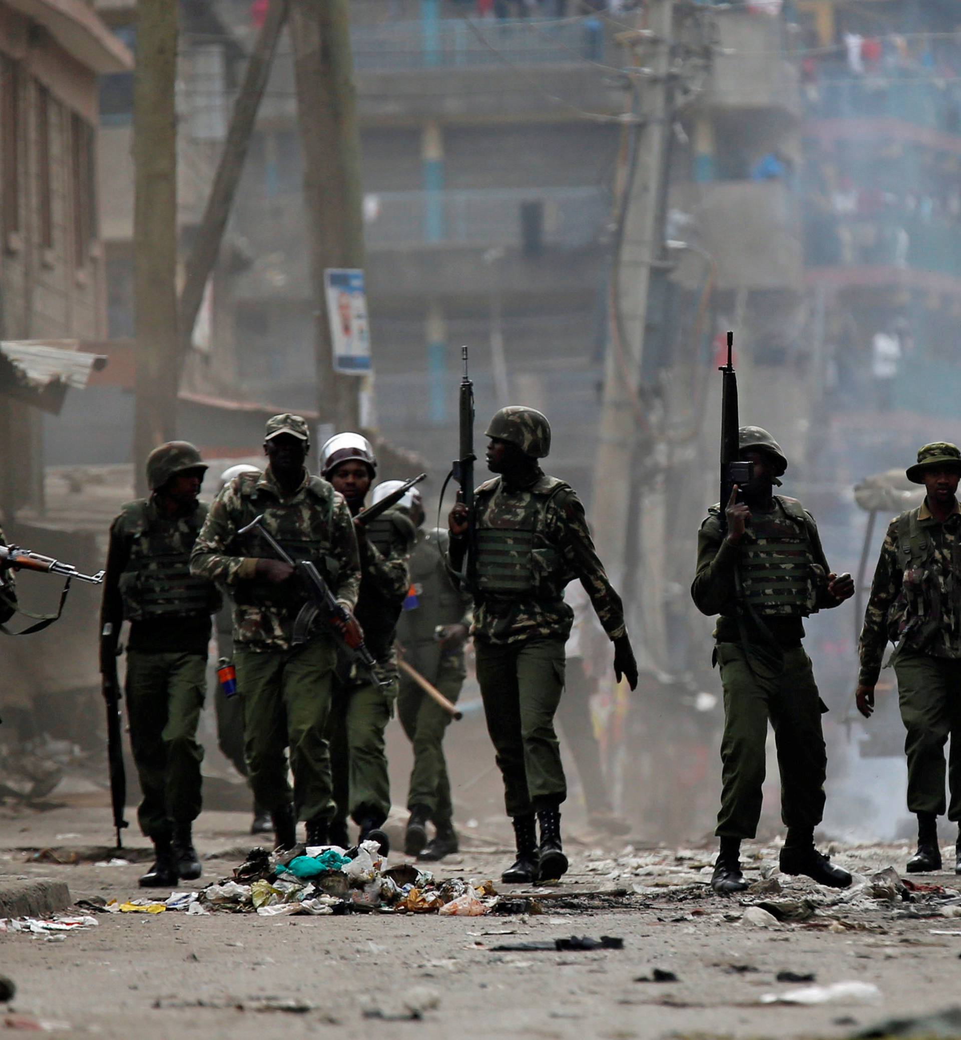 Anti riot policemen deploy to disperse demonstrators, supporting opposition leader Raila Odinga, in Mathare, in Nairobi