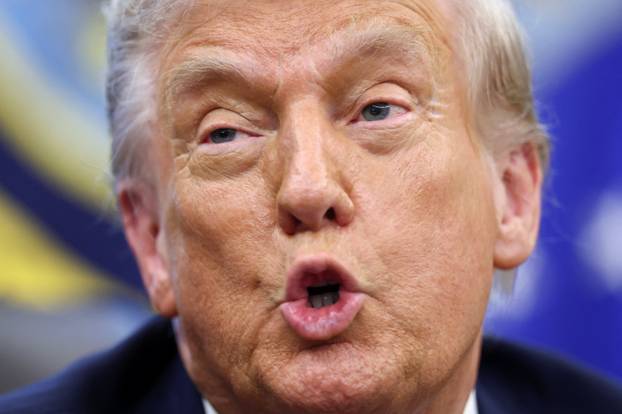 U.S. President Donald Trump signs executives orders at the White House in Washington, D.C.