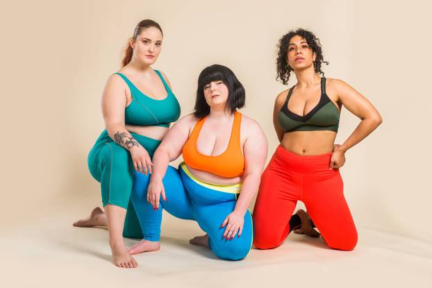 Plus size women posing for body acceptance