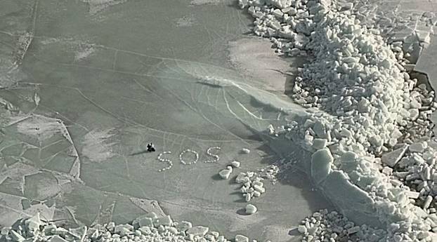 Tourists rescued after spelling 'SOS' in ice blocks while stranded on floe