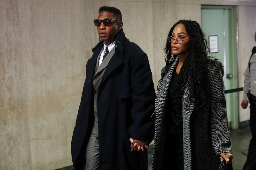 Actor Jonathan Majors arrives with Meagan Good for the jury selection in his assault and harassment case at Manhattan Criminal Court in New York City
