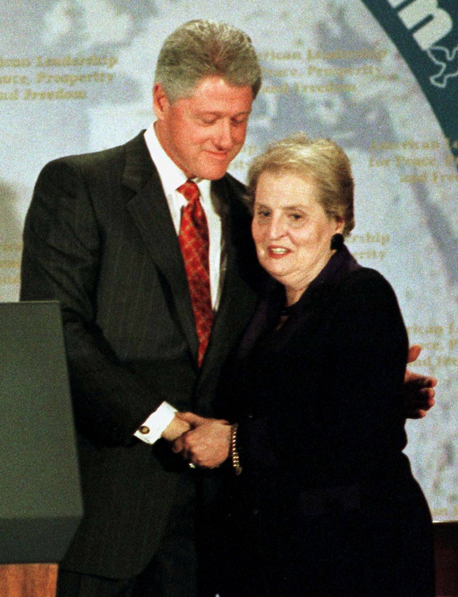 FILE PHOTO: PRESIDENT CLINTON EMBRACES MADELEINE ALBRIGHT AFTER SPEECH.