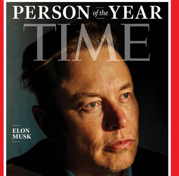 Elon Musk poses on the cover image of Time magazine