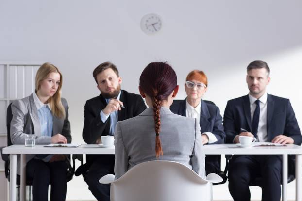 Woman,During,Job,Interview,And,Four,Elegant,Members,Of,Management