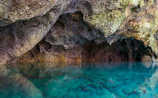 Beautiful,Blue,Underground,Waters,Contrasting,With,Orange,Rock,Formations,,The