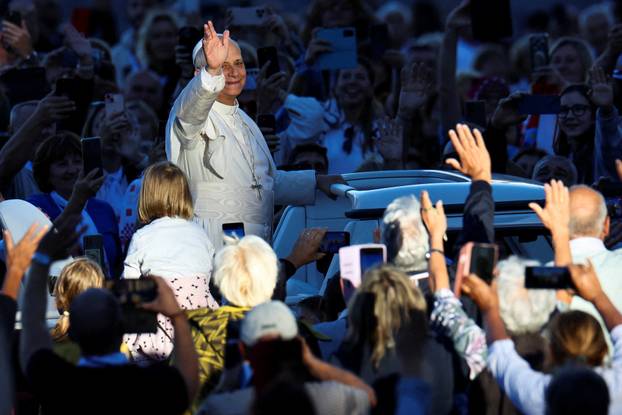Pope Leo XIV greets the faithful ahead of a Holy Mass presided over by Metropolitan Archbishop of Zagreb Drazen Kutlesa, at the Vatican
