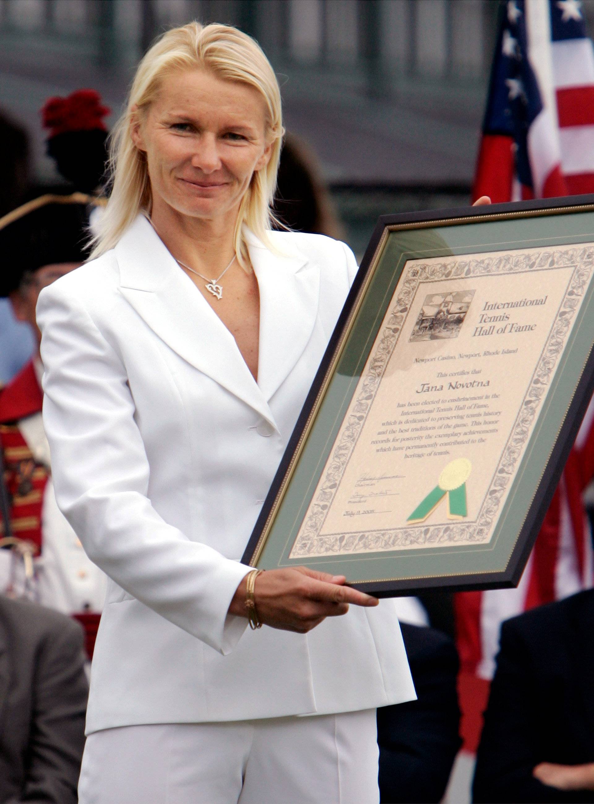 FILE PHOTO: Jana Novotna holds up International Tennis Hall of Fame certificate in Newport