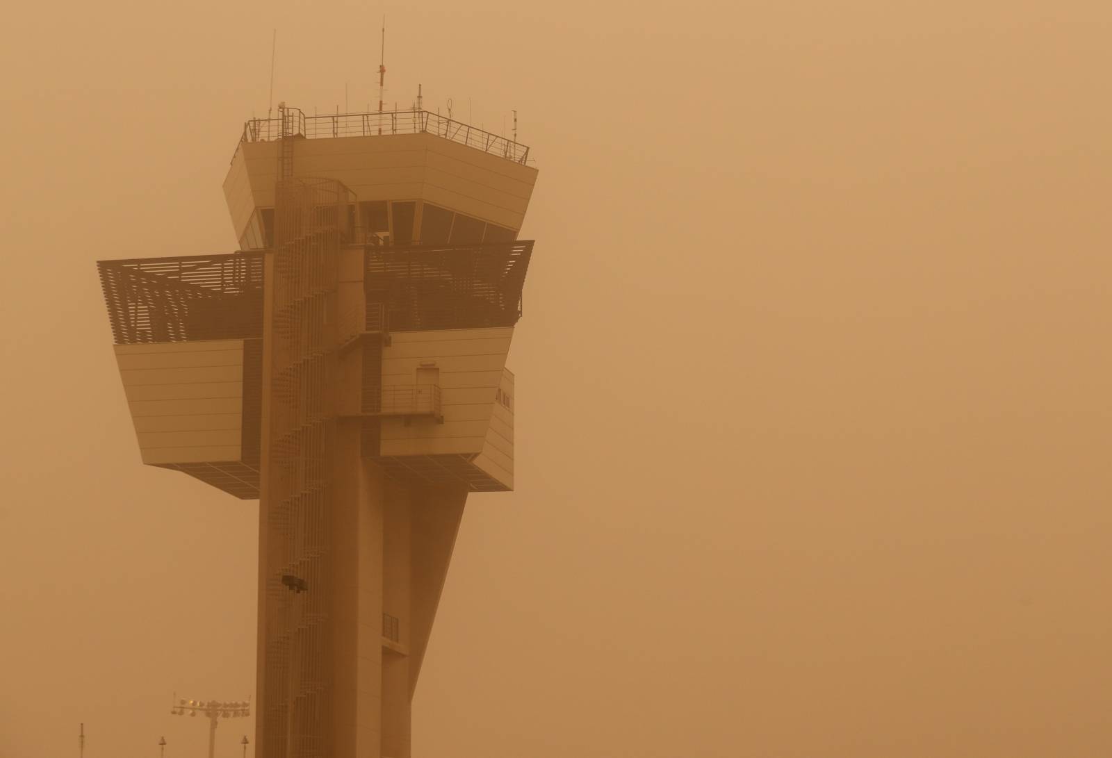 Control tower is pictured during a sandstorm blown over from North Africa known as "calima" at Las Palmas Airport