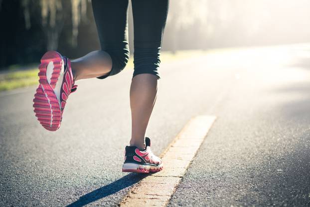 Sporty,Woman,Running,On,Road,At,Sunrise.,Fitness,And,Workout