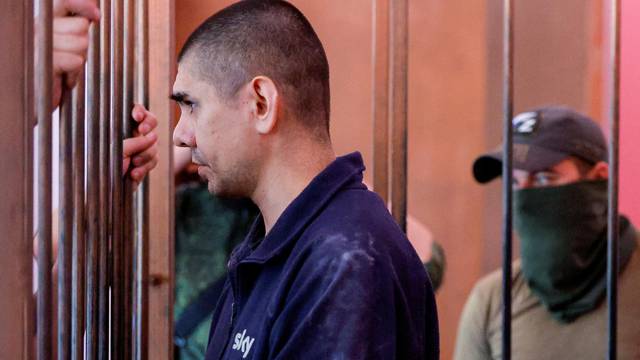 Foreign nationals captured during Ukraine-Russia conflict attend a court hearing in Donetsk