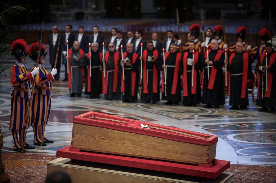 The Wider Image: Thousands line up to pay respect to Francis, the pope of 'outcasts'