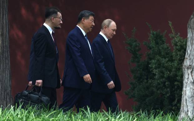 Russian President Vladimir Putin meets with Chinese President Xi Jinping in Beijing