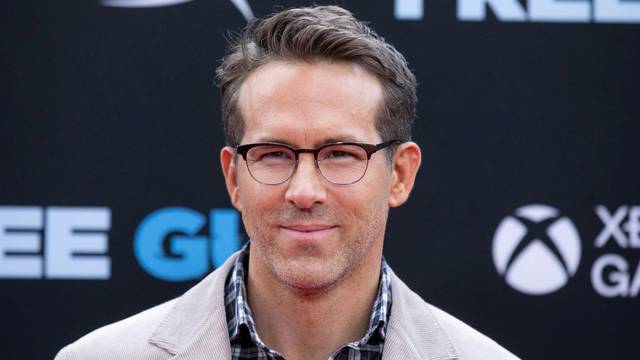 FILE PHOTO: Actor Ryan Reynolds poses at the premiere for the film "Free Guy" in New York