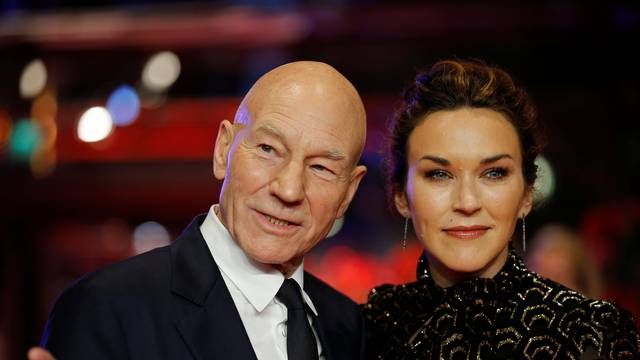 Actor Patrick Stewart and his wife Sunny Ozel arrive for the screening of the movie 'Logan' at the 67th Berlinale International Film Festival in Berlin