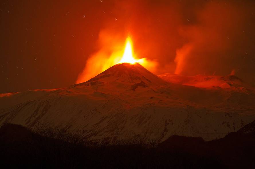 Nicolosi, Mount Etna erupting. The south east crater colors the nights of Catania