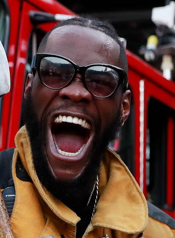 Deontay Wilder presents tickets to LA firefighters ahead of his WBC heavyweight title fight with Tyson Fury