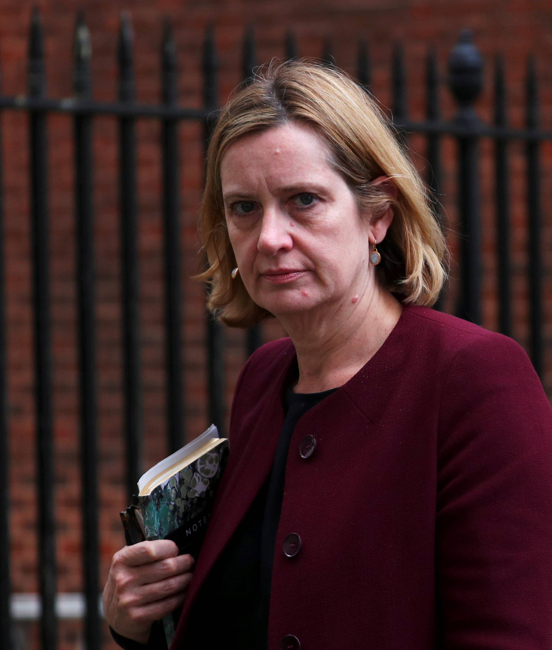 FILE PHOTO: Britain's Home Secretary Amber Rudd leaves 10 Downing Street in London