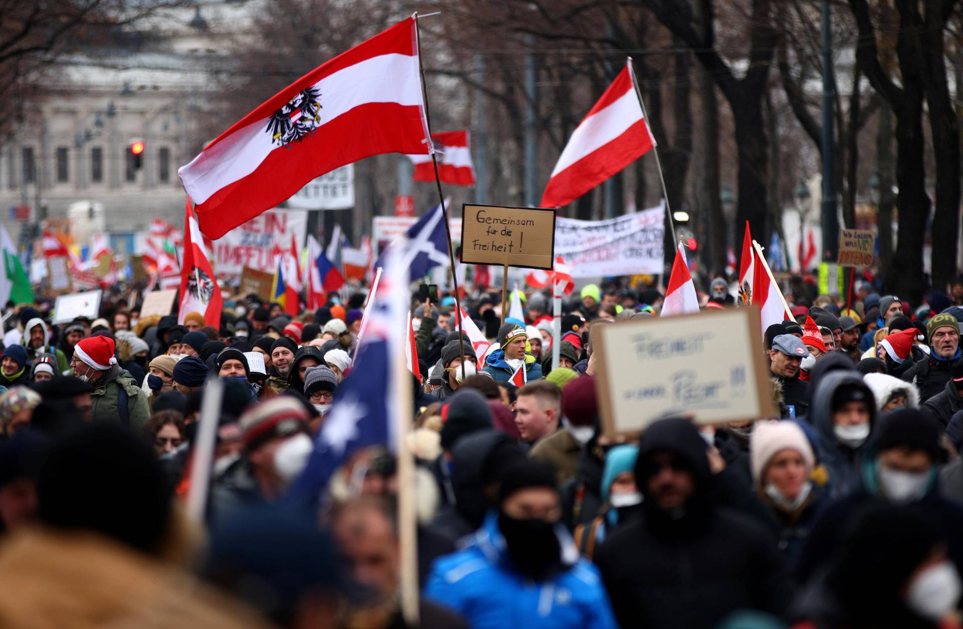 Thousands of people march to protest against restrictions on public life to curb the coronavirus pandemic