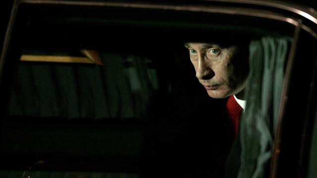 FILE PHOTO: Russia's President Putin looks from car after arriving at Sofia airport