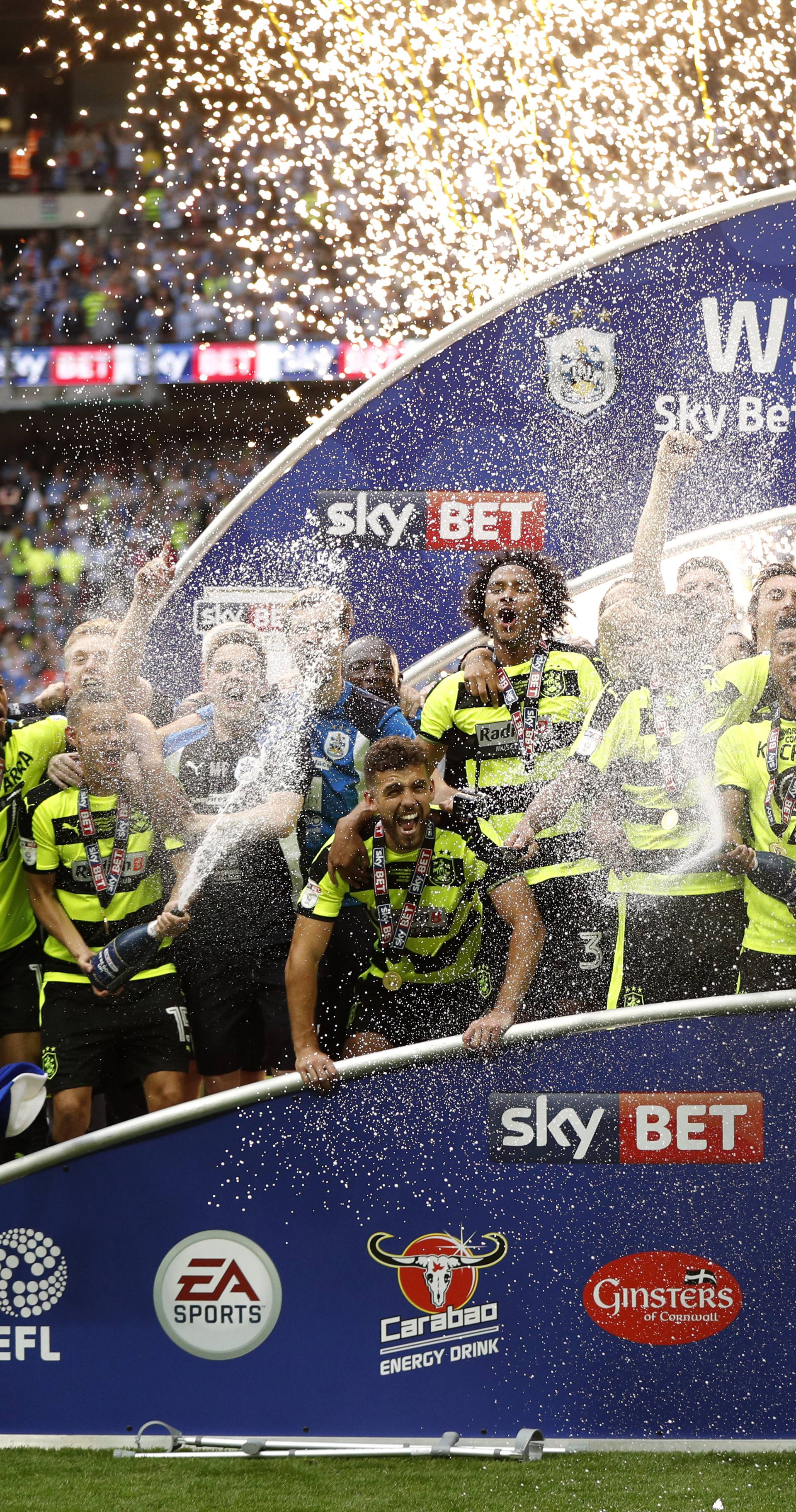 Huddersfield Town celebrate with the trophy after winning the Sky Bet Championship Play-Off Final and getting promoted to the Premier League