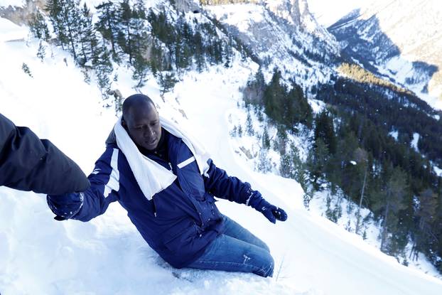 The Wider Image: Migrants risk death crossing Alps to reach France