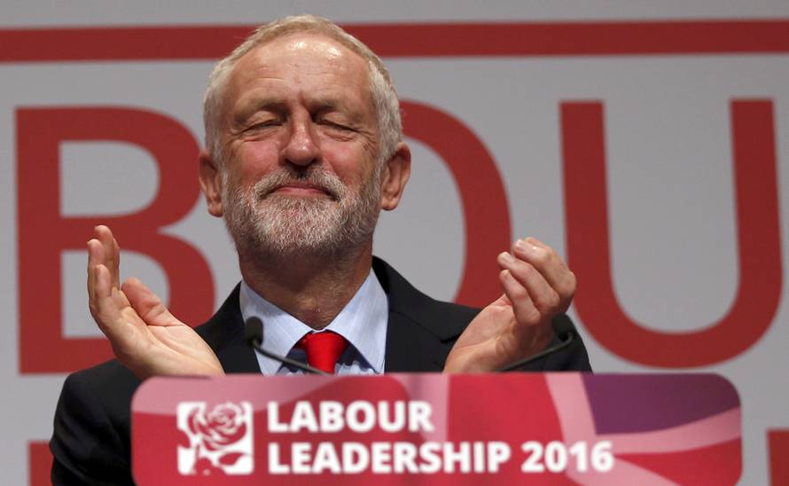 The leader of Britain's opposition Labour Party, Jeremy Corbyn, reacts after the announcement of his victory in the party's leadership election, in Liverpool