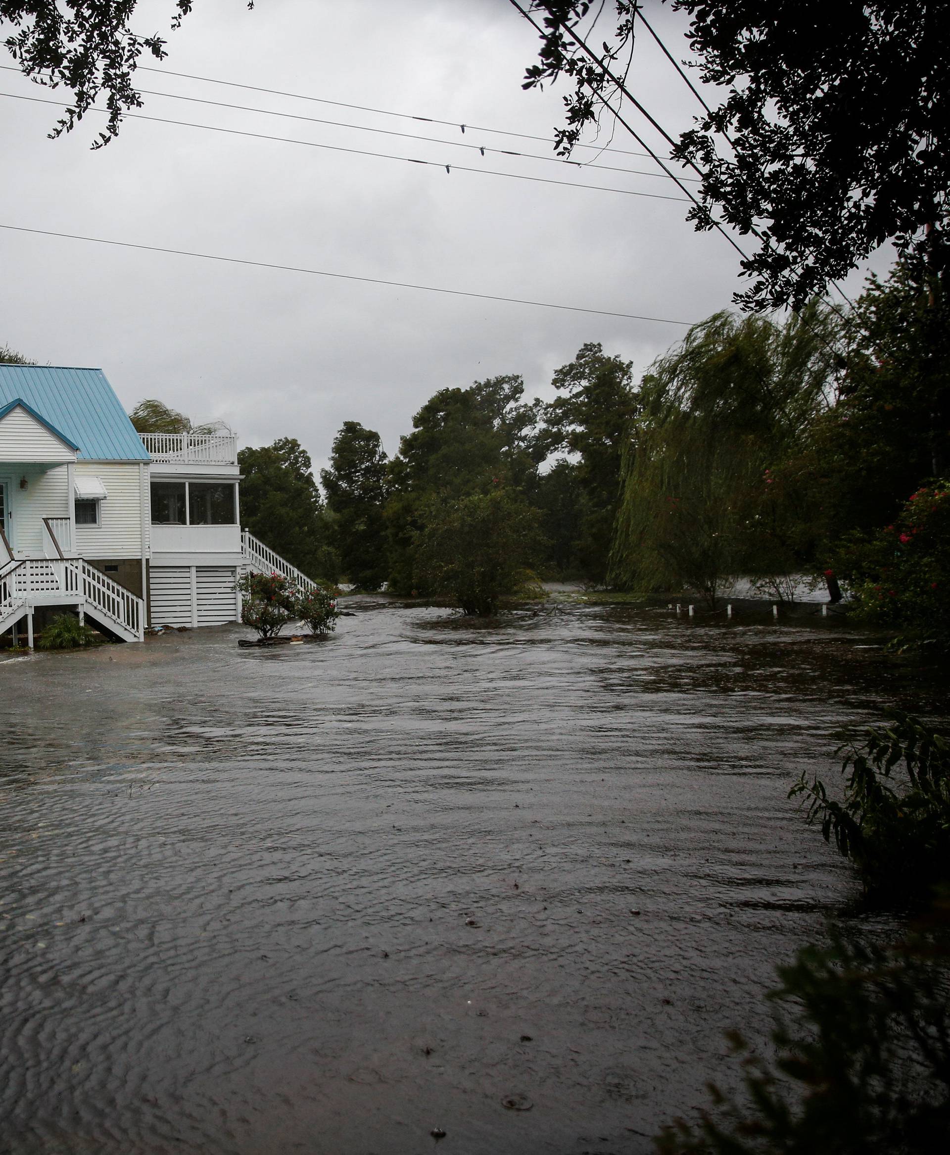 Water from Neuse River floods houses as Hurricane Florence comes ashore in New Bern