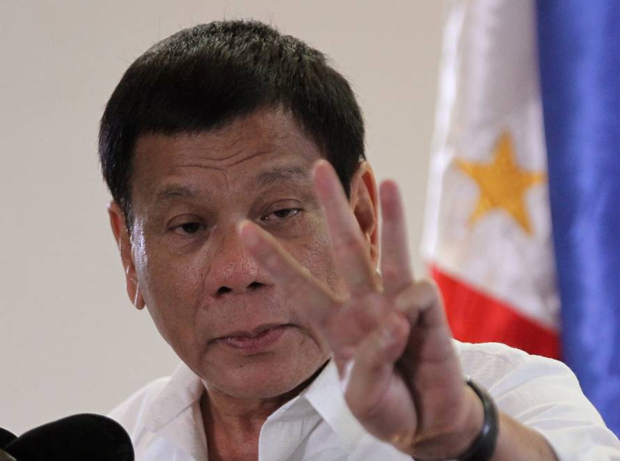 FILE PHOTO: Philippine President Rodrigo Duterte speaks upon his arrival at Davao International Airport in Davao city