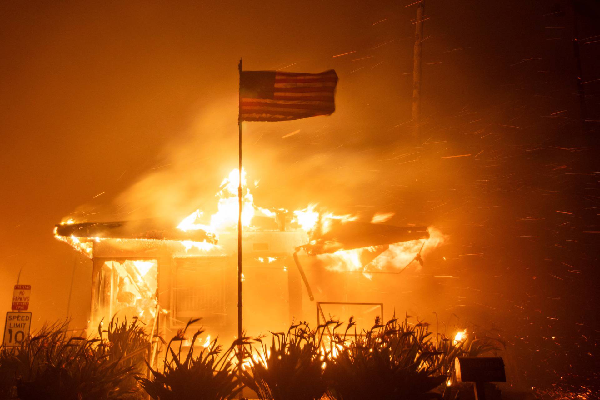 Palisades Fire burns during a windstorm on the west side of Los Angeles