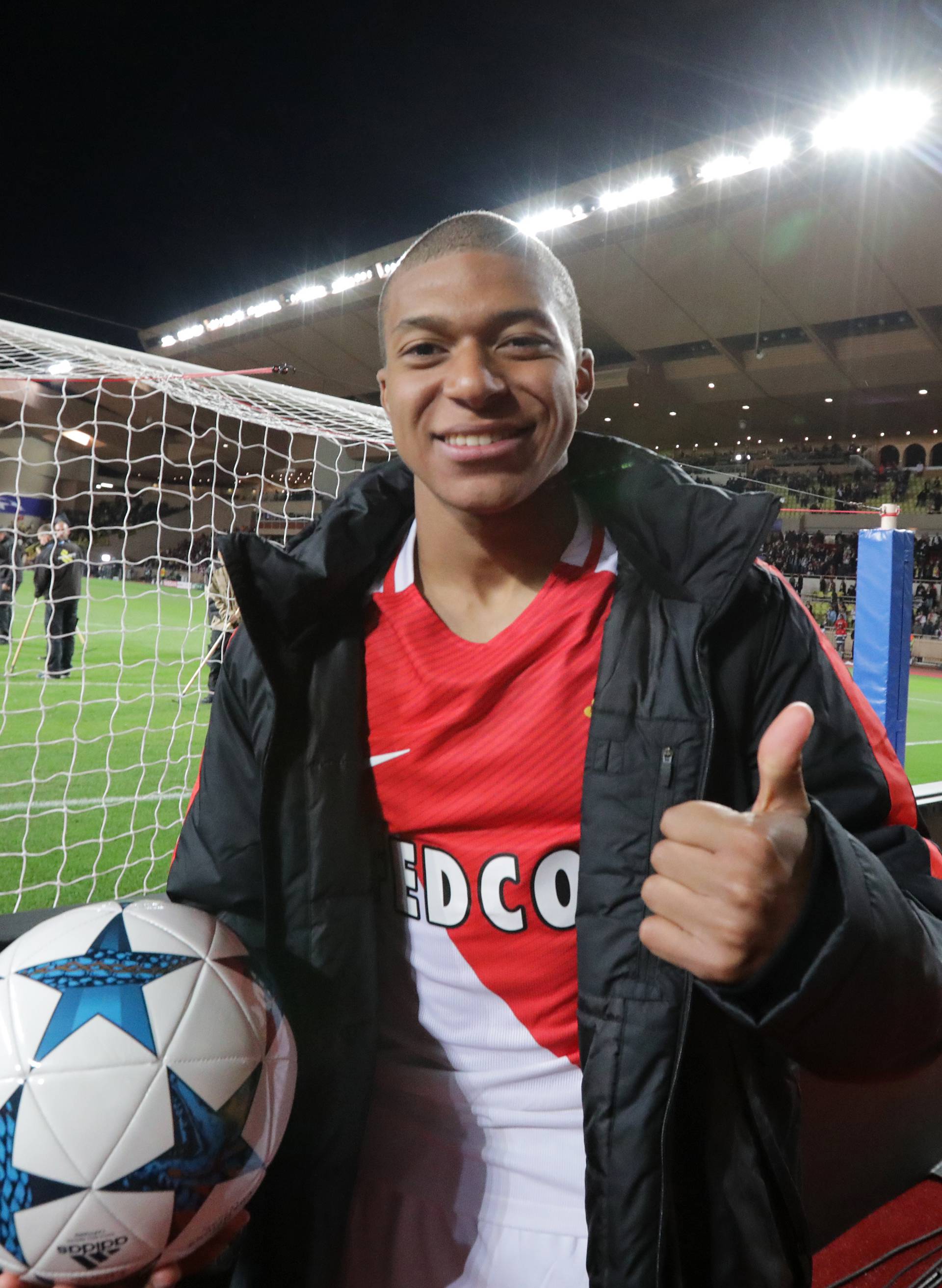 Monaco's Kylian Mbappe-Lottin celebrates after the match