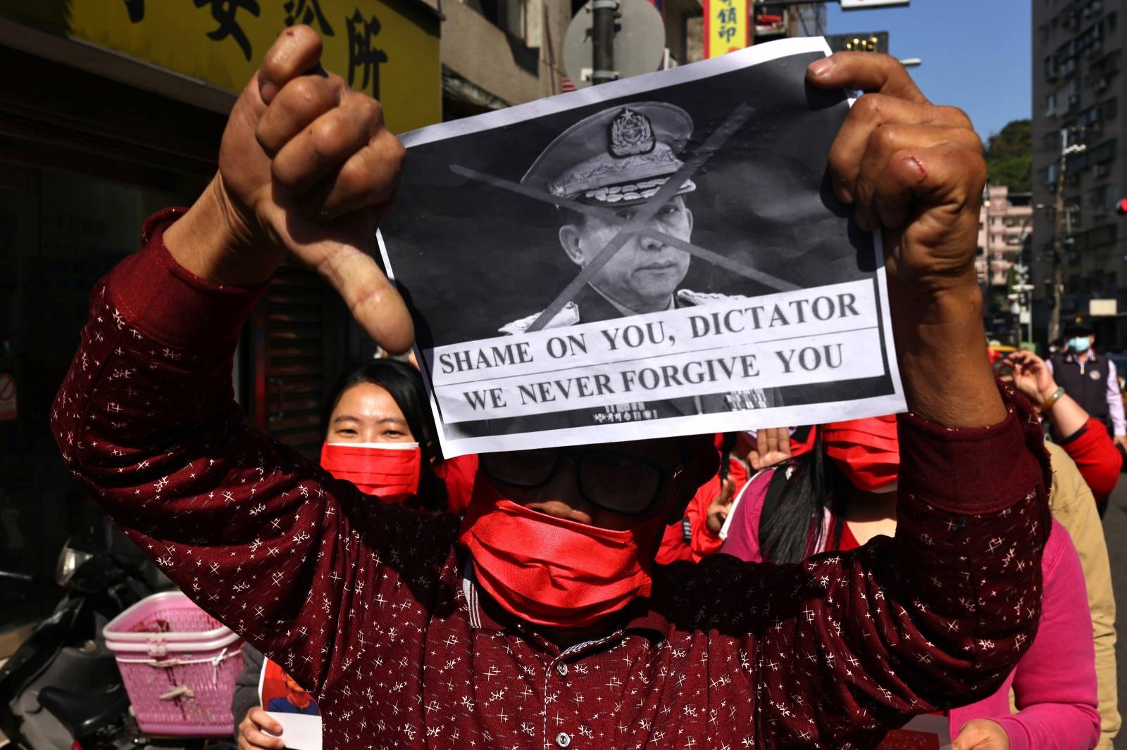 Members of the Burmese community in Taipei protest against the Myanmar military coup in Little Burma, home to many of Taiwan's Burmese immigrants, in Taipei