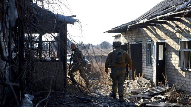 Ukrainian servicemen of the 1st Independent Tank Brigade near the frontline town of Vuhledar