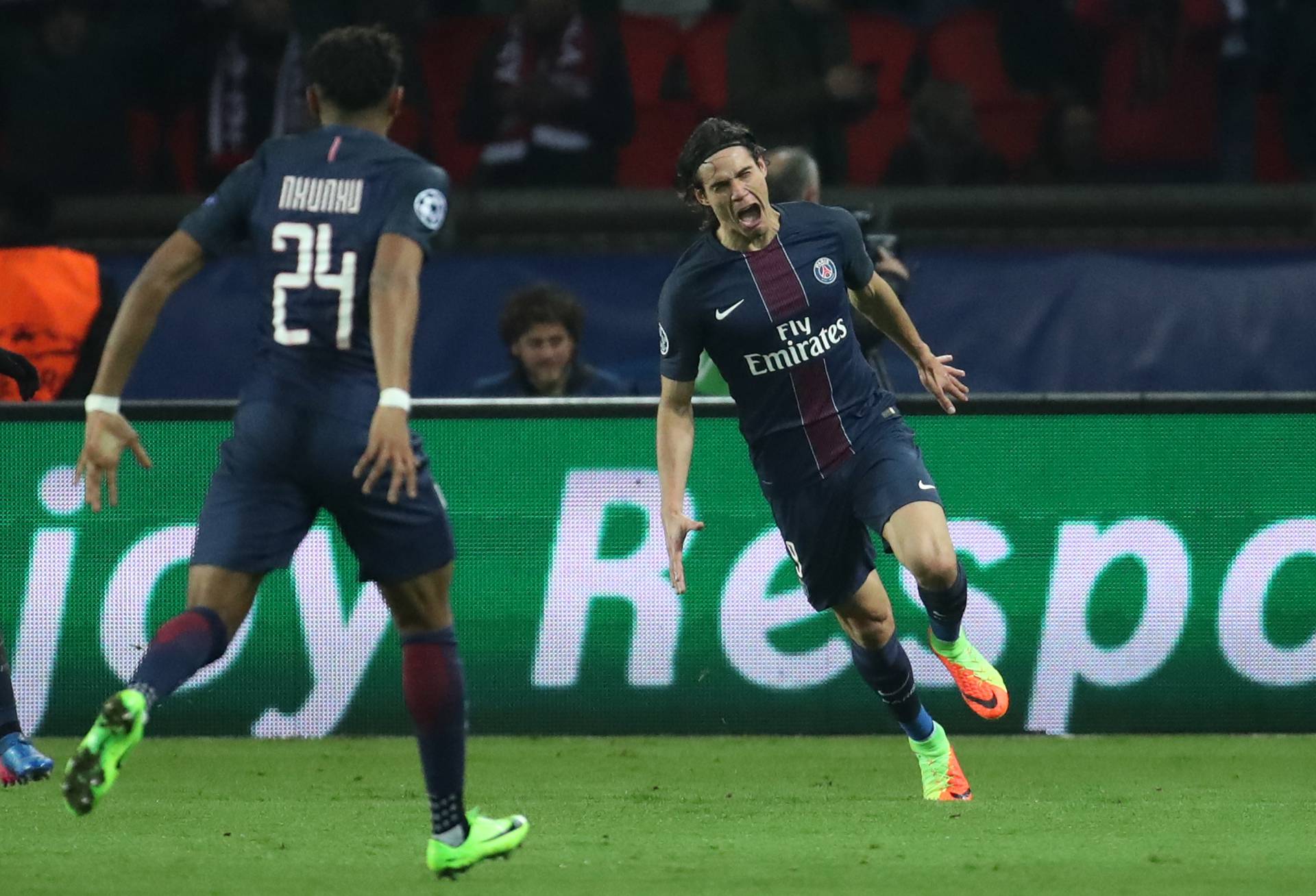 Paris Saint-Germain's Edinson Cavani celebrates scoring their fourth goal