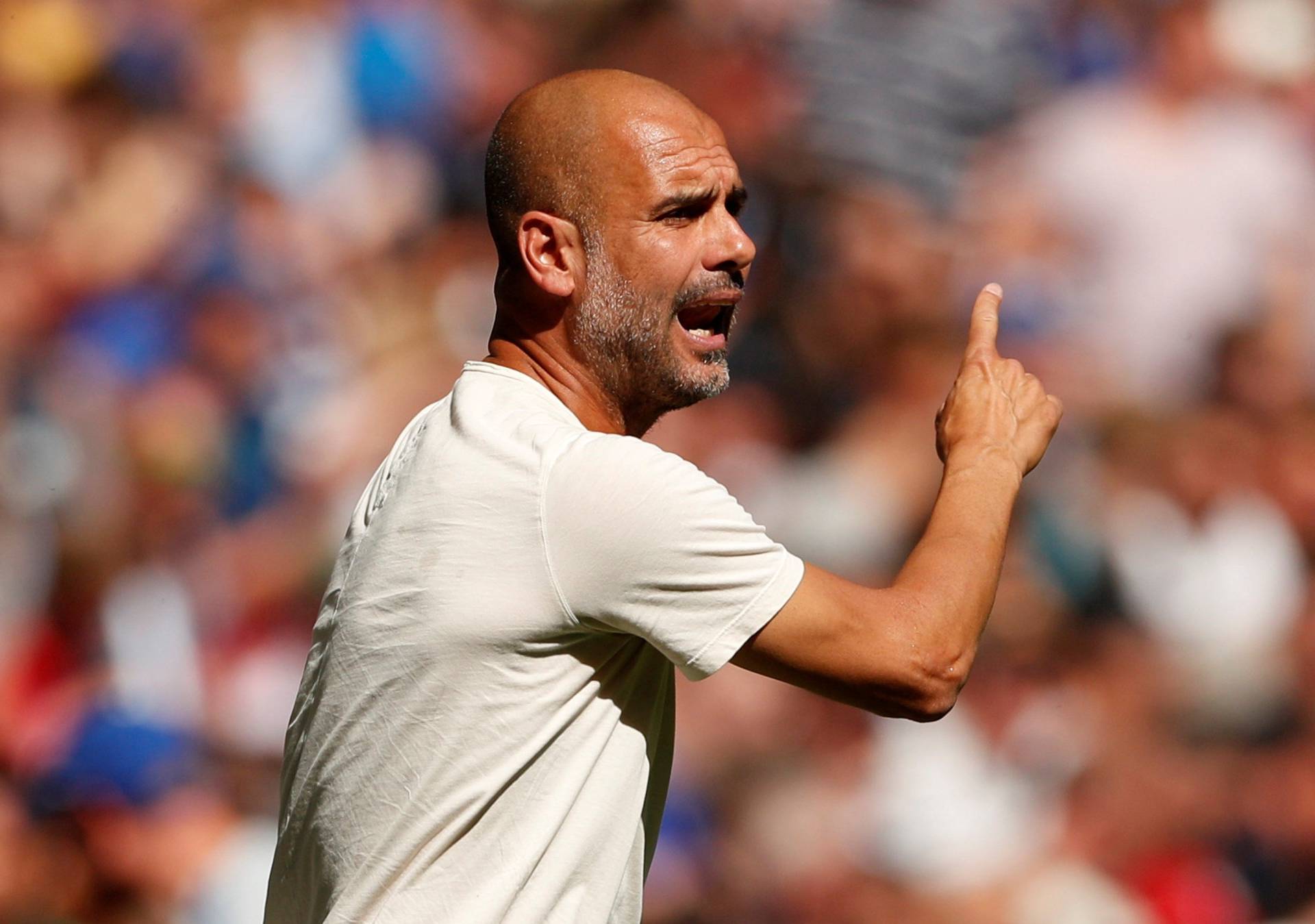 FILE PHOTO: Manchester City manager Pep Guardiola at Wembley Stadium, London, Britain - August 5, 2018