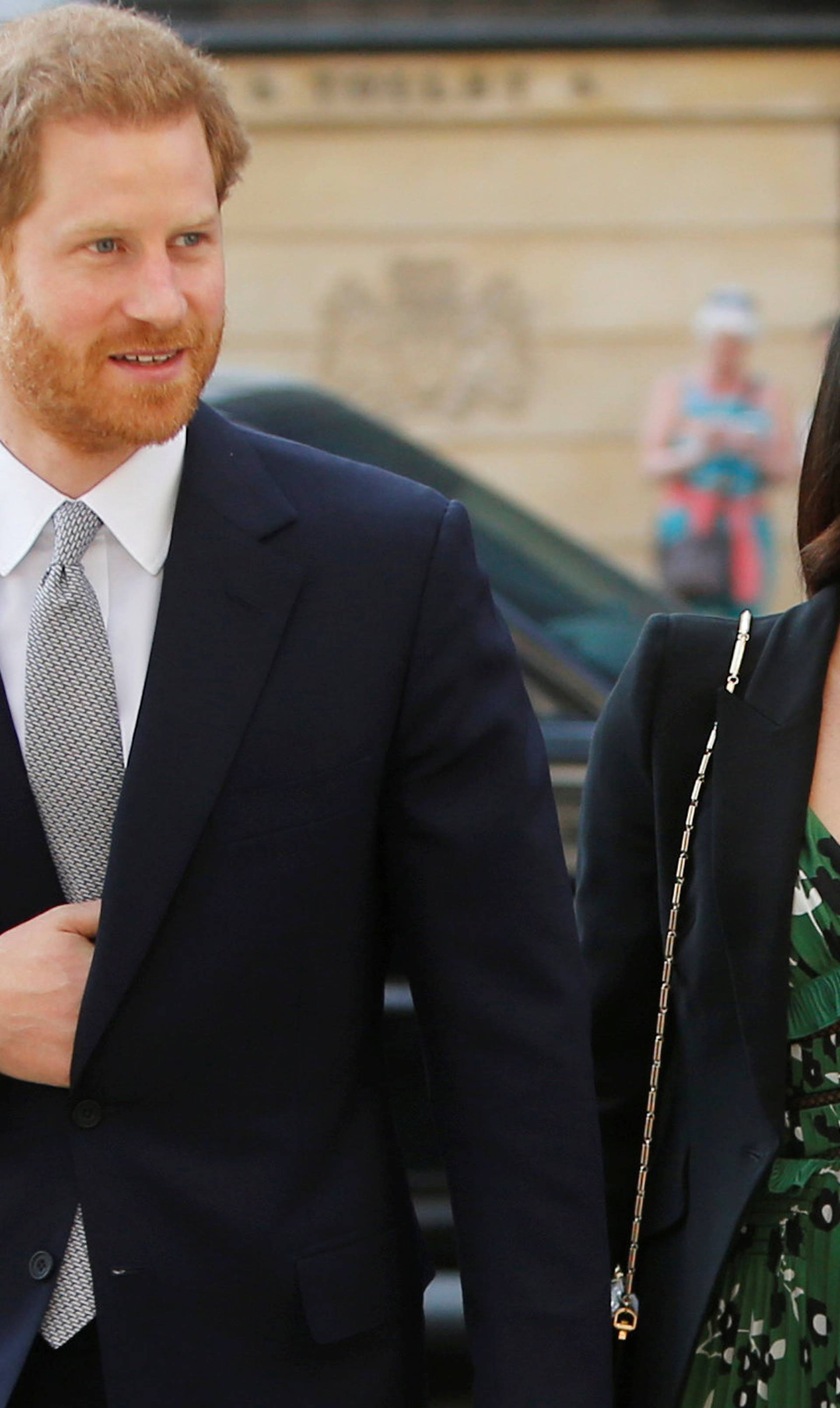 Britain's Prince Harry and Meghan Markle arrive to attend a reception celebrating the forthcoming Invictus Games Sydney 2018, hosted by Malcolm Turnbull, Prime Minister of Australia, and his wife Lucy Turnbull, at Australia House in London