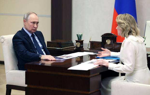 Russian Presidential Commissioner for Children's Rights Maria Lvova-Belova meets with Russian President Vladimir Putin outside Moscow