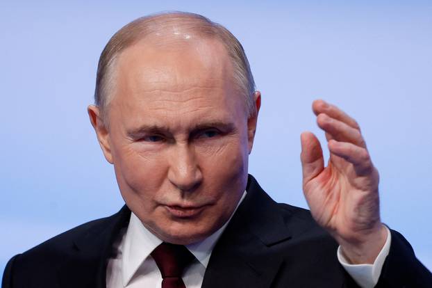 Russian incumbent President Putin speaks after polling stations closed, in Moscow