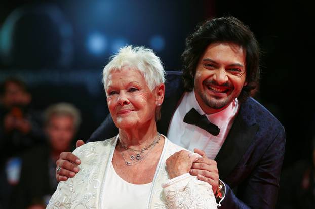 Actors Ali Fazal and Judi Dench pose during a red carpet for the movie "Victoria and Abdul" at the 74th Venice Film Festival in Venice