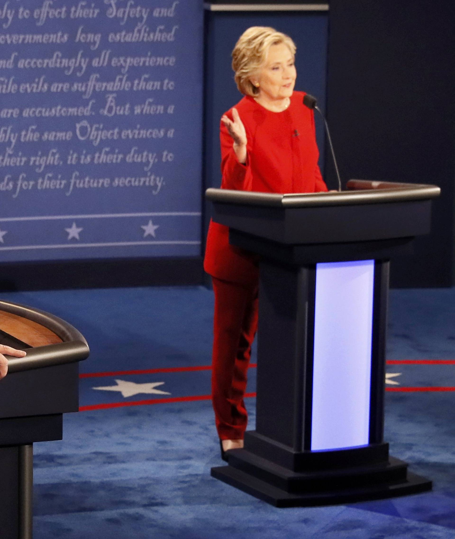 Republican U.S. presidential nominee Donald Trump and Democratic U.S. presidential nominee Hillary Clinton discuss a point during their first presidential debate at Hofstra University in Hempstead