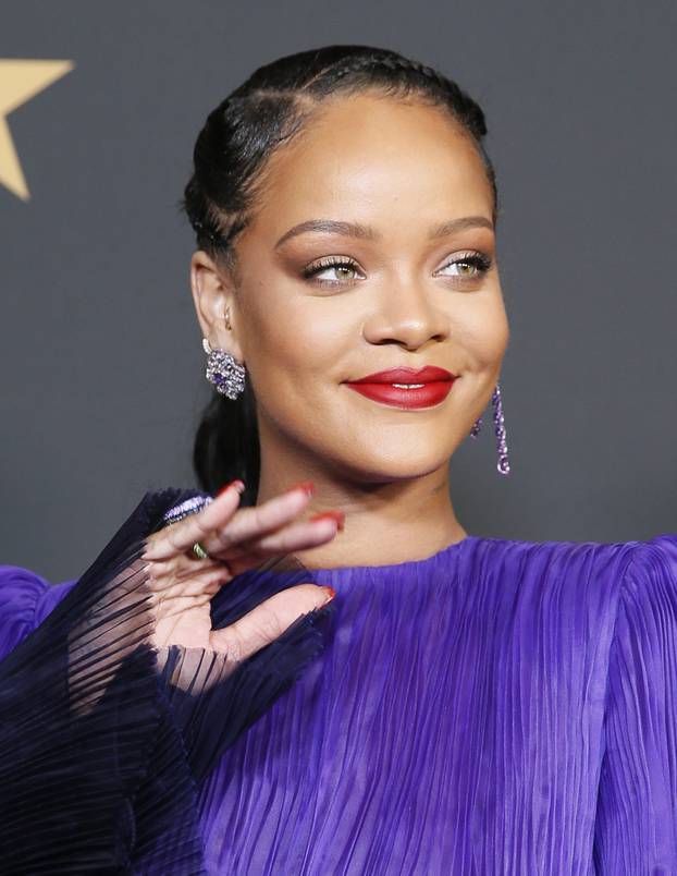 51st NAACP Image Awards – Photo Room– Pasadena - Rihanna poses backstage with her President