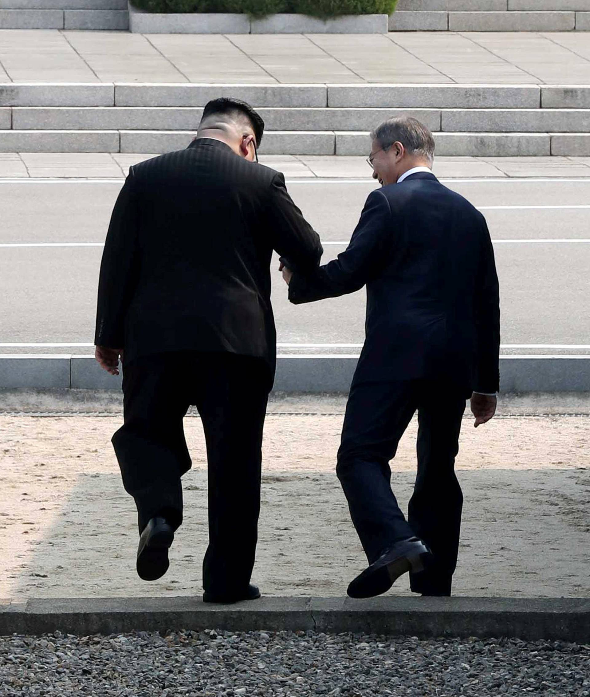 South Korean President Moon Jae-in and North Korean leader Kim Jong Un meet in the truce village of Panmunjom