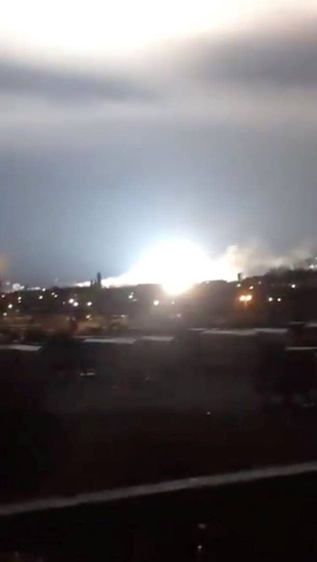 Bright light is seen after a transformer explosion on Thursday at an electric power station in Queens