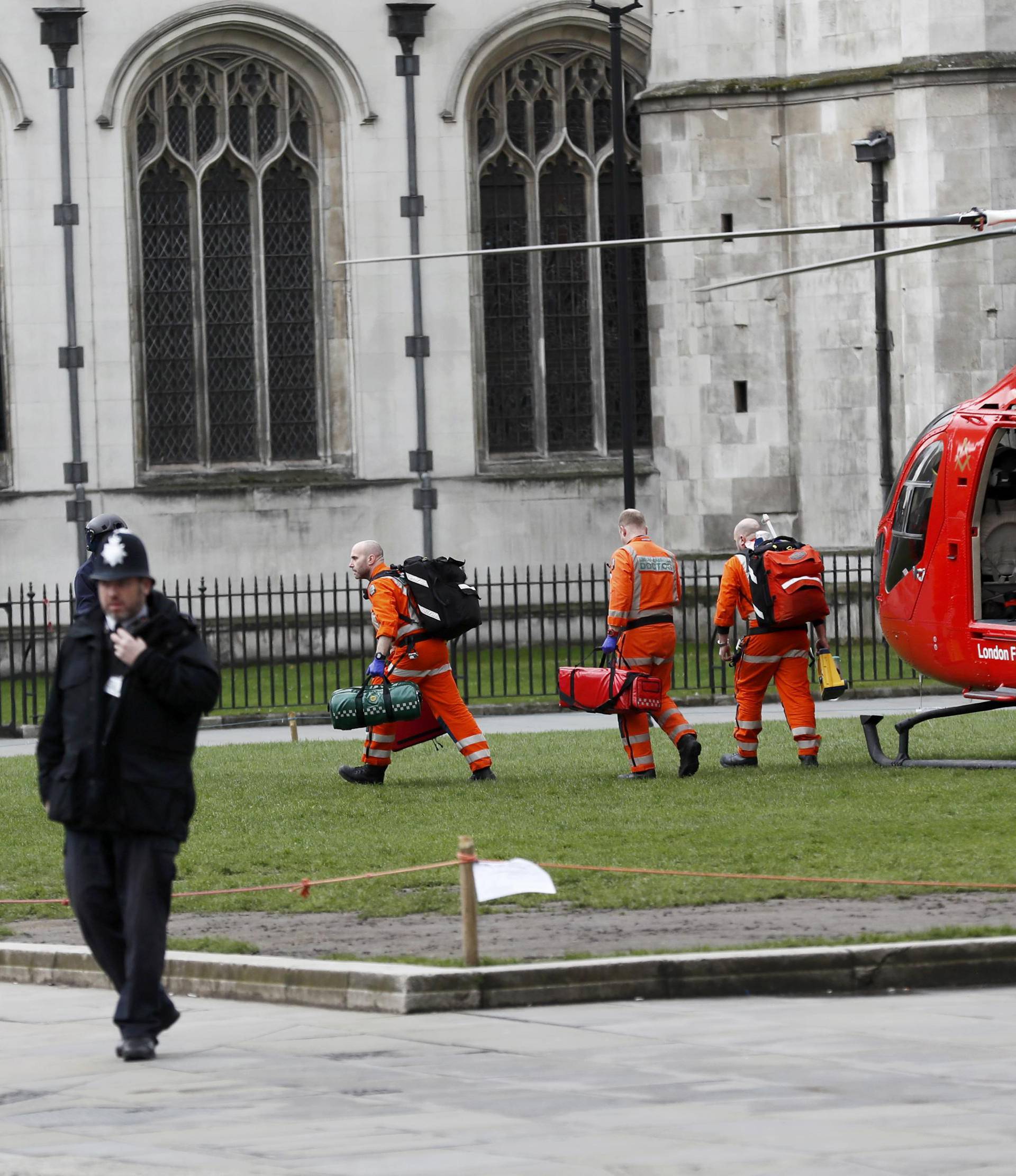 An air ambulance lands in Parliament Square during an incident on Westminster Bridge in London