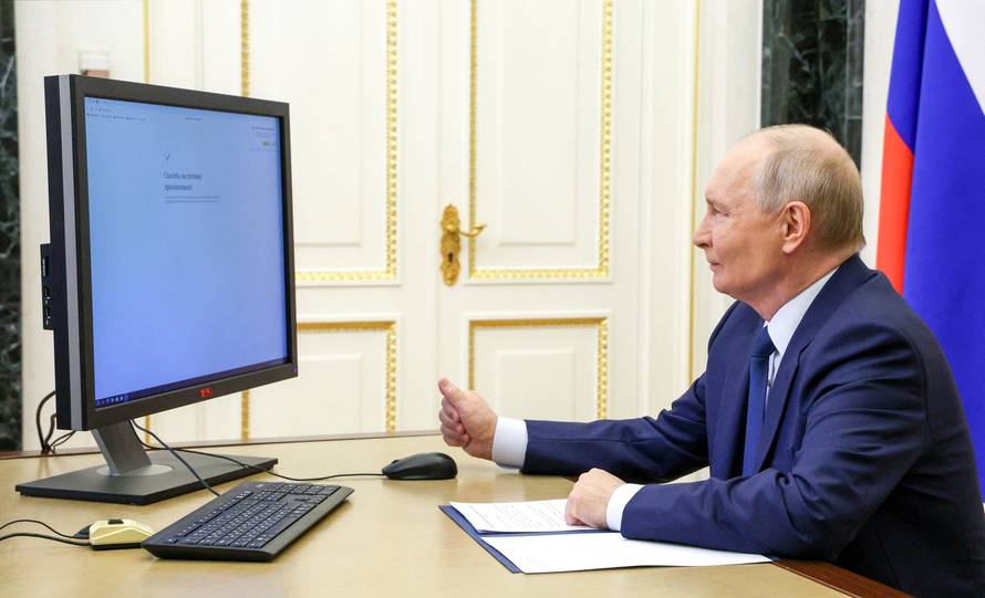 Russian President Putin votes online in the parliamentary election in Moscow