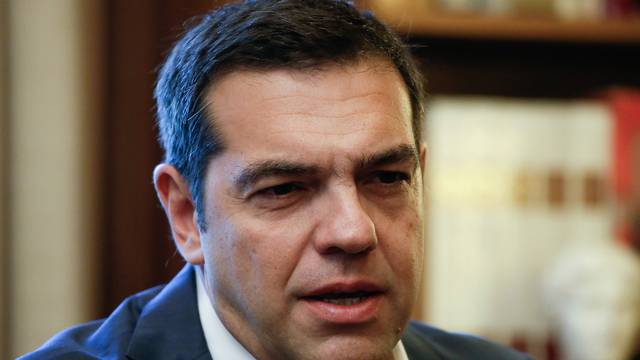 Greek Prime Minister Alexis Tsipras briefs Greek President Prokopis Pavlopoulos on developments on the name dispute with Macedonia, in Athens